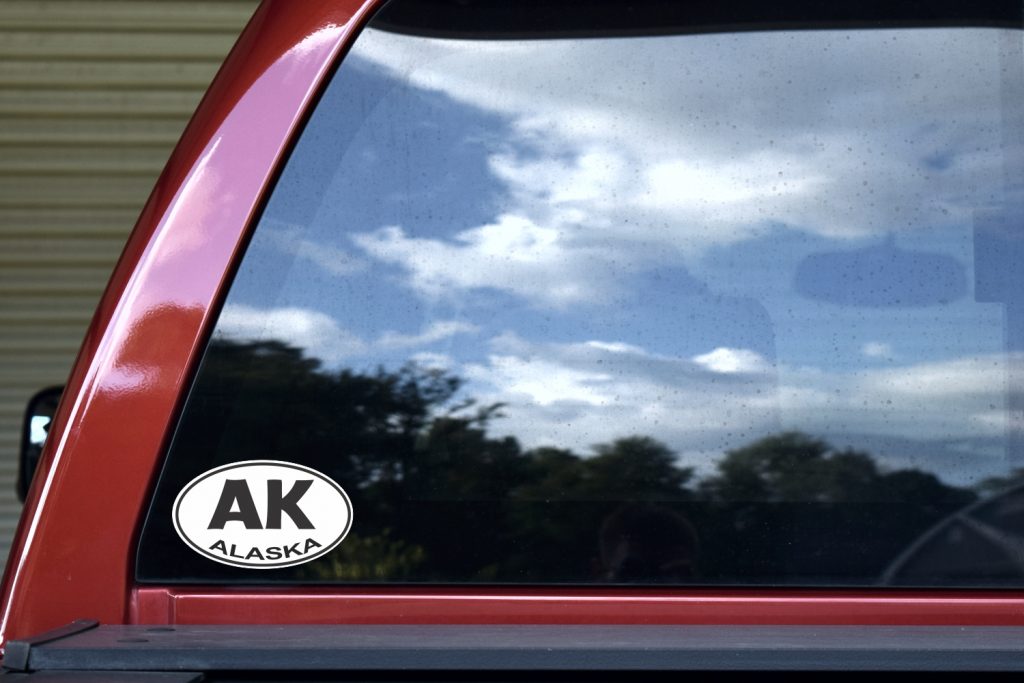 In X In Oval Alaska Sticker